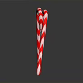 Crossed Red And White Striped Candy Canes Against Dark Background With Shiny Reflection