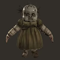 Creepy Old Doll With Tattered Green Dress Sparse Hair And Damaged Face