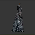 Dark Patterned Long Dress Displayed On Mannequin With Gray Background