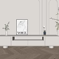 Modern White TV Stand with Artwork Plants and Decorative Items on Wooden Floor