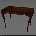 Red Wooden Table With Golden Carvings On Elegant Legs And Dark Top