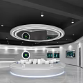 Modern Exhibition Hall Featuring Circular Ceiling Design Multiple Display Screens And White Counters