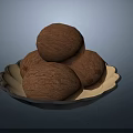 Fresh Ripe Coconuts Stacked On A Decorative Plate For