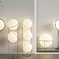 Modern Floor Lamps With Spherical Shades And Metal Frames For Indoor Lighting