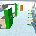 Open Exhibition Space With Green Display Panels And Directional Signage