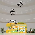 Yellow Bus Shaped Stage With Hanging Pandas Decorations Plants And Nothing But Sign