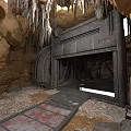 Cave Interior With Metal Gate Surrounded By Rocks Stalactites And Stone Path