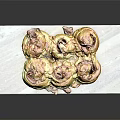 Savory Rolled Pastries Topped With Tomato Sauce On Marble Serving Board With Fresh Herbs