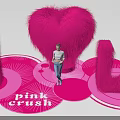 Vibrant Pink Crush Display With Heart Shape I U Plush Decorations And Person