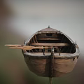 Vintage Wooden Boat With Traditional Hull And Wooden Oars On Deck
