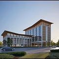 Modern Residential Building Exterior With Sloped Roof Landscaping And Parked Cars