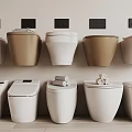 Different Styles Of Wall Mounted And Floor Standing Toilets In White And Brown Colors