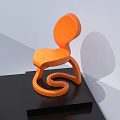 Orange Modern Single Chair With Unique Curved Design On Black Platform
