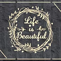 Illuminated Lighting Set with Wreath Design and Life is Beautiful Lettering on Dark Stone Wall