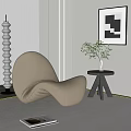 Gray Lounge Chair with Side Table Vase Green Plant and White Spiral Decorative Column