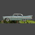 Light Blue Vintage Classic Car With White Roof Streamlined Design And Chrome Accents