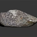 Raw Natural Mineral Rock With Multicolored Surface Texture And Reflective Base