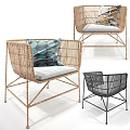 Stylish Wicker Leisure Chairs With Light Brown And Black Frames And Patterned Cushions