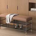 Modern Entryway Bench With Gray Blanket And Shoes Under Wooden Cabinet