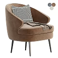 Beige Accent Chair with Black White Houndstooth Cushion and Brown Throw on Black Slender Legs