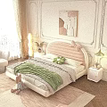 Double Bed with Pink Curved Headboard Bow Detail Green Blanket White Nightstand Lamp Beige Curtains