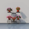 Metal Stand With Wheels Holding Multiple Bonsai Potted Plants With Pink And Red Flowers Indoor