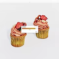 Delicious Homemade Cupcakes With Pink Frosting And Fresh Strawberry Toppings