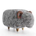 Sheep Shaped Stool With Gray Plush Surface And Brown Ram Horns On Wooden Legs