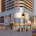Bustling Commercial Street with Tall Buildings Glass Curtain Walls Store Signs and Pedestrians