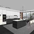 Modern Kitchen Interior With White Cabinets Black Island Counter And Appliances