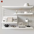 Decorative Ornaments Set on Modern White Shelves with Glass Globe Vase Books and Table Lamp