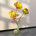 Floral Display Featuring Yellow Flowers in Green Snail Shaped Vase with Light Wall Shadow