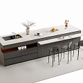 Modern Bar Counter With Gray Cabinets White Countertop Vase Fruits Cups And Bar Stools
