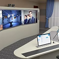 Modern Conference Room With Multiple Computer Screens Microphones Large Display Screen And People In Meeting