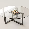 Round Glass Top Coffee Table With Black Metal Frame And Magazine