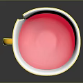 White Decorative Cup With Golden Handle Chipped Rim Pink Liquid And Colorful Base