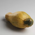 Two Fresh Pumpkins One Round And One Long On White Surface