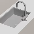Modern Stainless Steel Kitchen Sink With Black Faucet On White Countertop