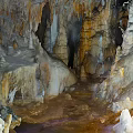 Underground Cave Scenery With Stalactites Stalagmites Natural Rock Formations Dripping Water And Rocky Walls