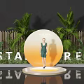 Floral Display Installation With Circular Platform Model Green Dress Palm Trees Bamboo Fence Backdrop