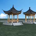 Chinese Garden Landscape Featuring Two Traditional Pavilions With Black Roofs And Green Grass