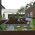 Courtyard Garden Design With Wooden Deck Lounge Chairs Stone Spheres Green Plants And Lantern Lights