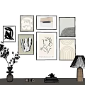Minimalist Modern Wall Gallery With Various Artworks And Table Decor Items 3d model
