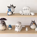 Cute Plush Totoro Stuffed Toys with Umbrella Bus Shaped Figures on Wooden Shelf