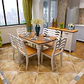 Restaurant Dining Area With Wooden Table White Chairs Flower Vase And Green Curtains