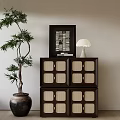 Entryway Side Cabinet Featuring Glass Door Compartments Black Frame White Lamp And Potted Bamboo