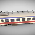 Vintage Train Carriage With Red White Blue Exterior Featuring Row Of Windows And Roof Equipment