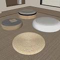 Round Indoor Cushions With Woven And Padded Designs On Beige Carpet