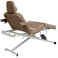 Electric Medical Treatment Table With Beige Leather Surface And Metal Frame