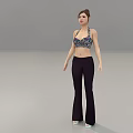 A Woman Wearing Floral Halter Top And Dark Flared Pants Against Gray Background